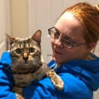 LIV for PETS Dog Walking and Pet Sitting in Slip End Harpenden Caddington and Markyate - About Us Picture - Owner holding Bengal cat